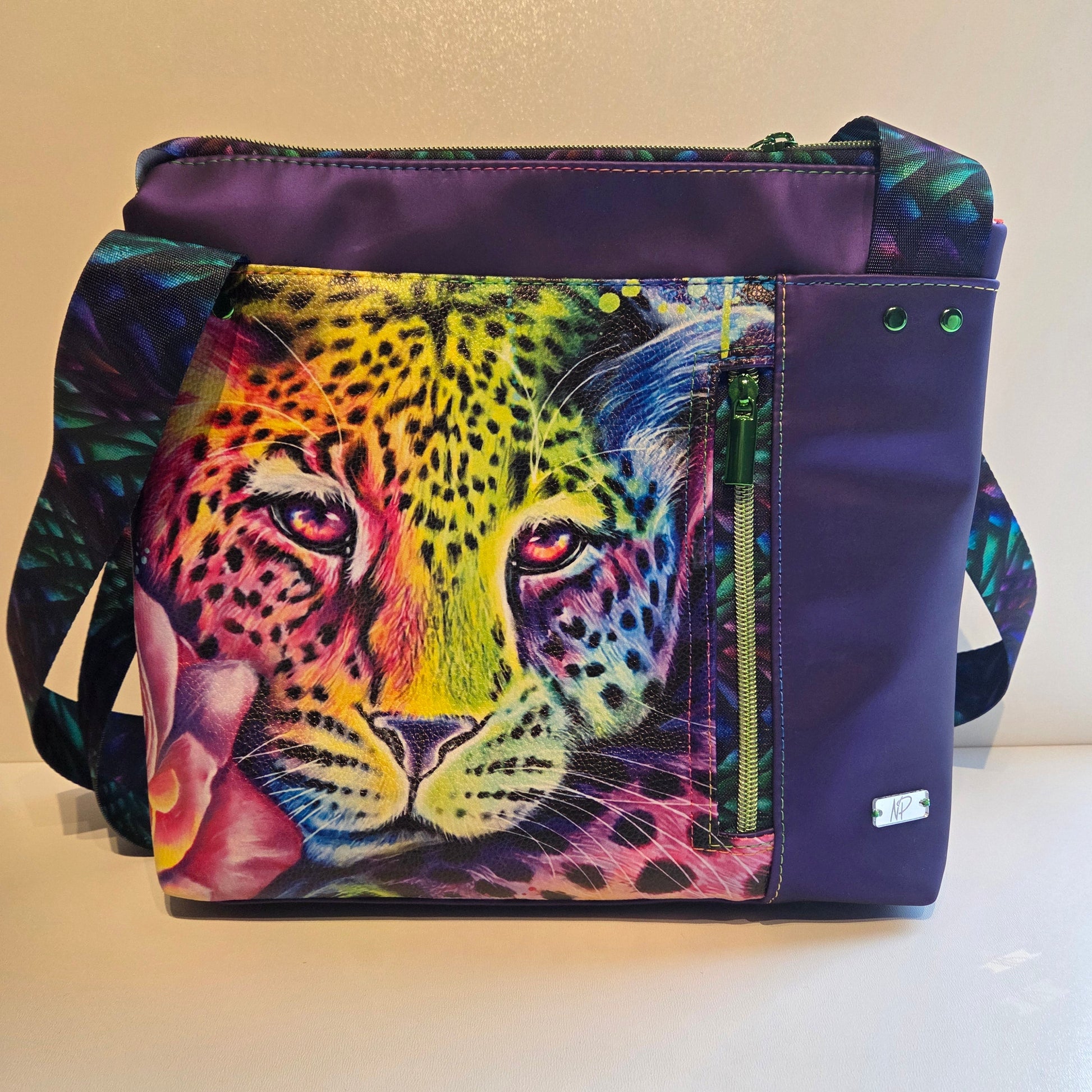 Tote with a colourful leopard design on a plain background