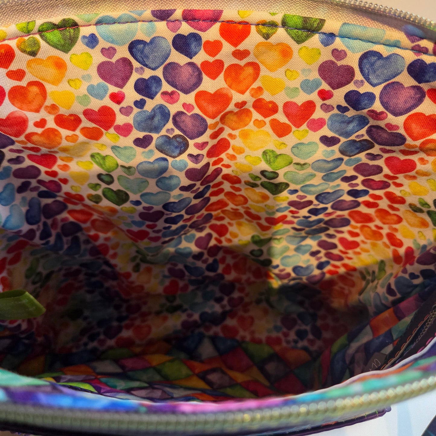 Colourful heart-patterned fabric inside a bag
