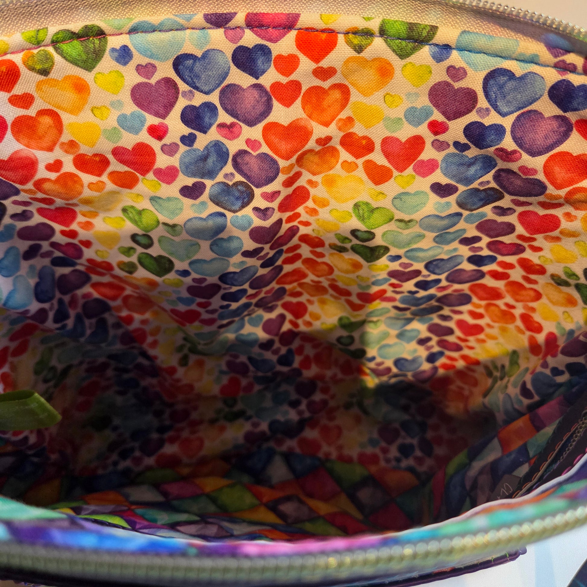 Colourful heart-patterned fabric inside a bag